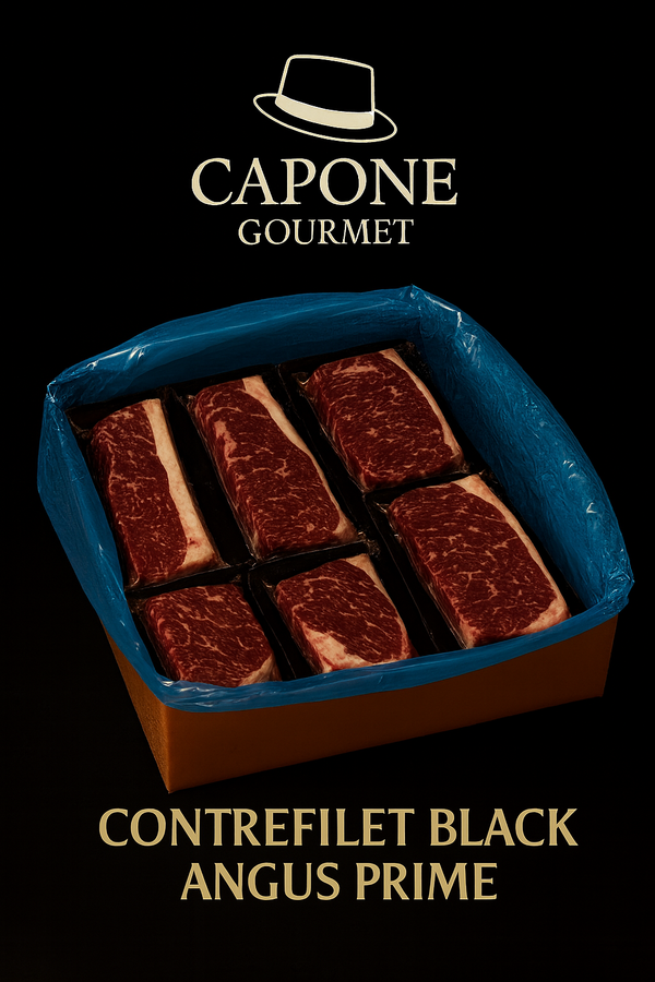 Caisse Capone Gourmet remplie de steaks de contrefilet Black Angus Prime, portionnés et emballés sous vide, présentés sur fond noir prestige.